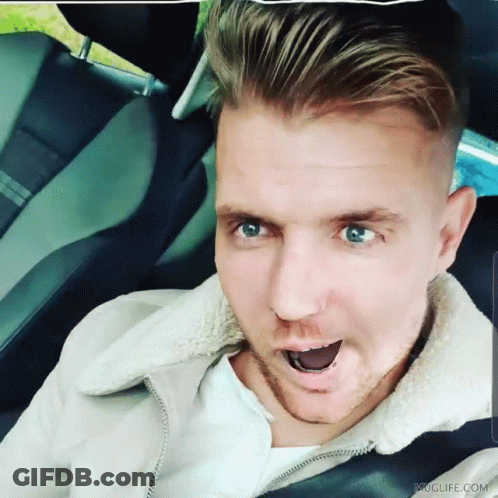 Man Sitting In Car With Mouth Open GIF
