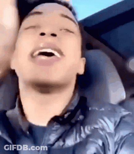 Man Sitting In Car With Mouth Open GIF
