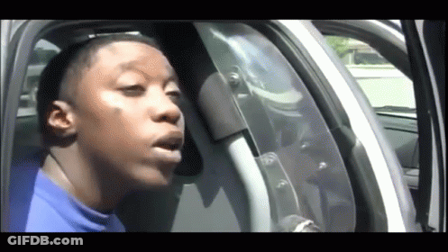 Man Sitting In Car With Mouth Open GIF