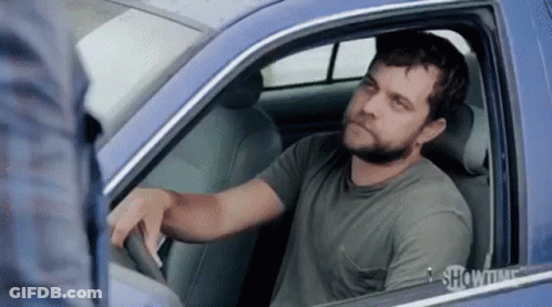 Man Sitting In Car With Showtime On Window GIF