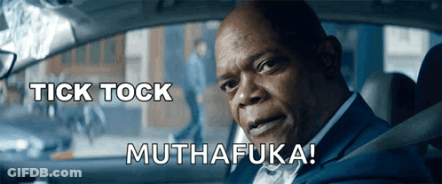 Man Sitting In Car With Tick Tock Muthafuka GIF