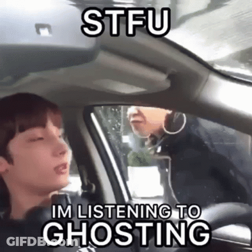 Man Sitting In Car With Woman Behind Him STFU Im Listening To Ghosting GIF