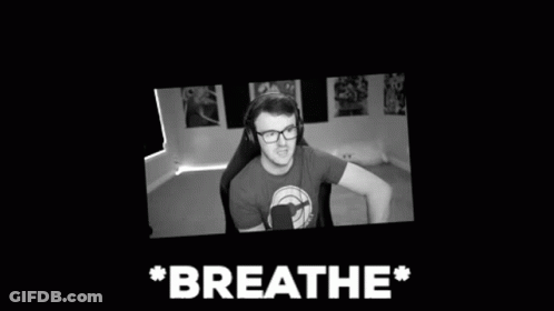 Man Sitting In Chair Black And White Breathe GIF