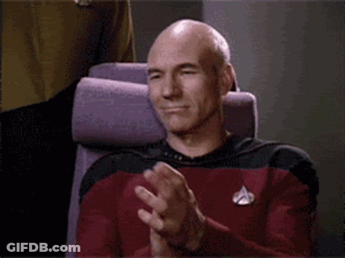 Man Sitting In Chair Clapping GIF