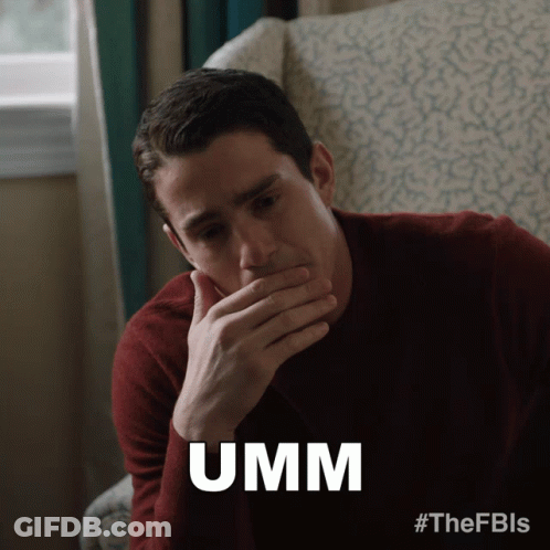 Man Sitting In Chair Covering Mouth Saying Umm GIF