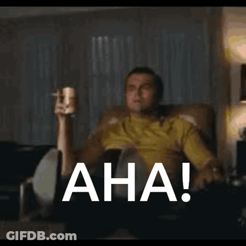 Man Sitting In Chair Holding Beer And Cigarette With Aha Behind Him GIF