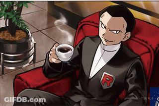 Man Sitting In Chair Holding Coffee GIF