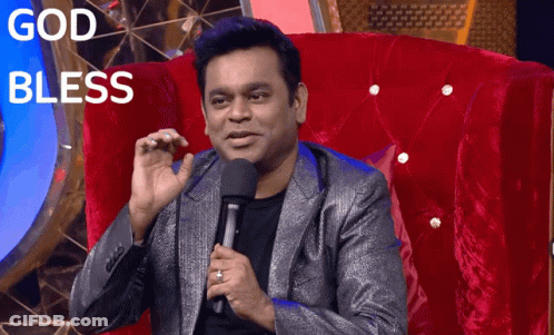 Man Sitting In Chair Holding Microphone God Bless GIF