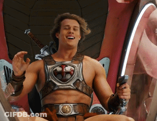 Man Sitting In Chair Holding Sword And Shield GIF