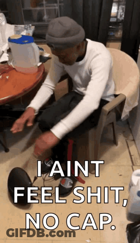 Man Sitting In Chair I Ain't Feel Shit No Cap GIF