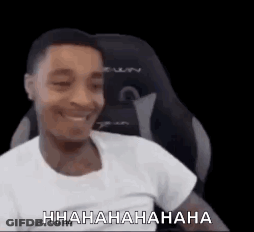 Man Sitting In Chair Laughing GIF