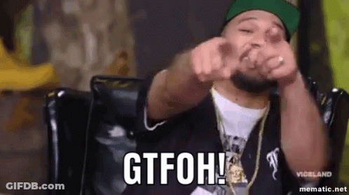 Man Sitting In Chair Making Funny Face Pointing At Camera GIF