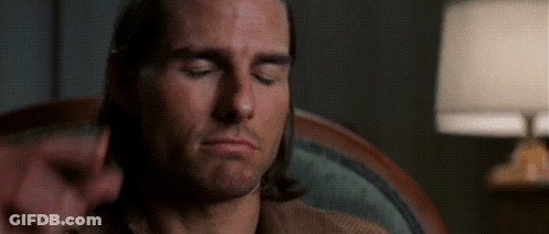Man Sitting In Chair Next To Lamp Eyes Closed GIF