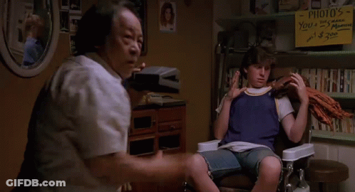Man Sitting In Chair Next To Woman Saying You're Welcome GIF