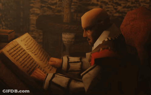 Man Sitting In Chair Reading Foreign Language Book GIF
