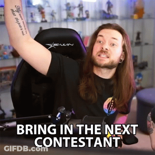 Man Sitting In Chair Saying Bring In The Next Contest GIF