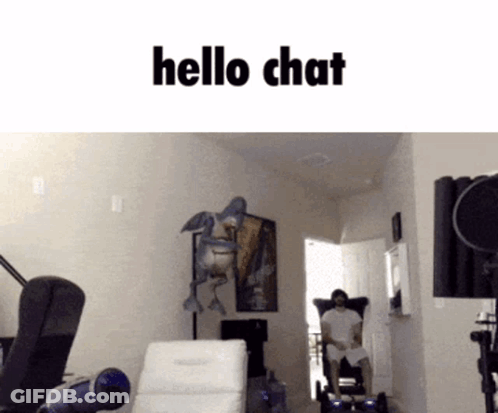 Man Sitting In Chair Saying Hello Chat GIF