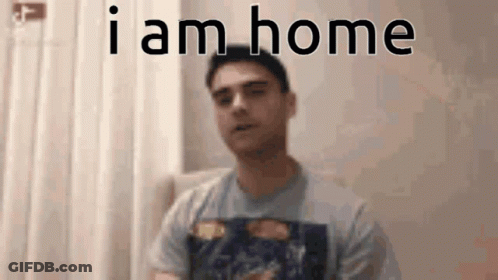 Man Sitting In Chair Saying I Am Home GIF