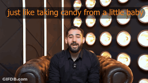 Man Sitting In Chair Saying Just Like Taking Candy From A Little Baby GIF