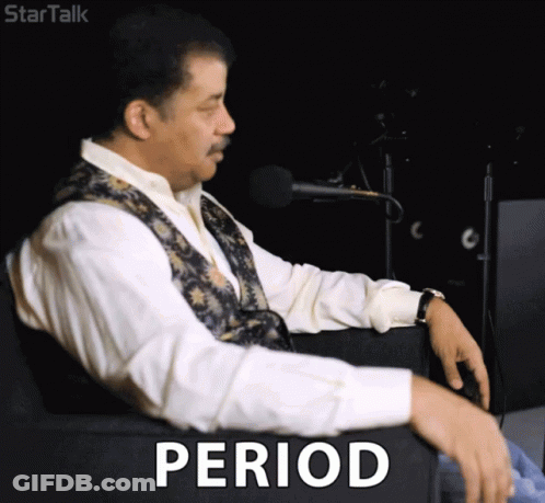 Man Sitting In Chair Saying Period GIF