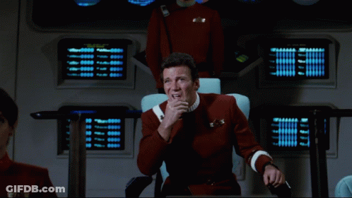 Man Sitting In Chair Saying This Is Damn Peculiar GIF