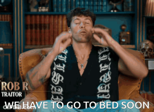 Man Sitting In Chair Saying We Have To Go To Bed Soon GIF