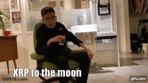 Man Sitting In Chair Saying XRP To The Moon GIF