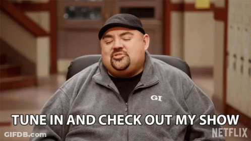 Man Sitting In Chair Says Tune In And Check Out My Show On Netflix GIF