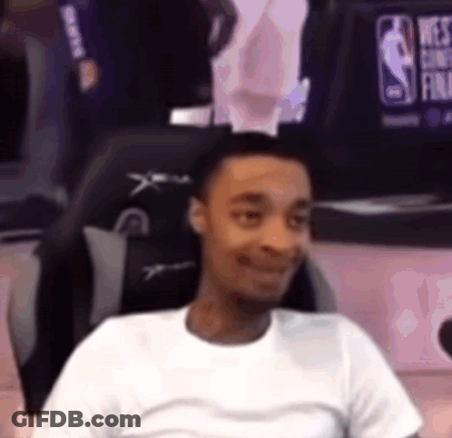 Man Sitting In Chair Smiling GIF