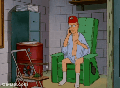Man Sitting In Chair Talking On Cell Phone GIF