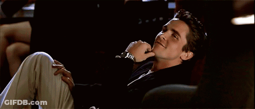 Man Sitting In Chair Wearing Watch GIF