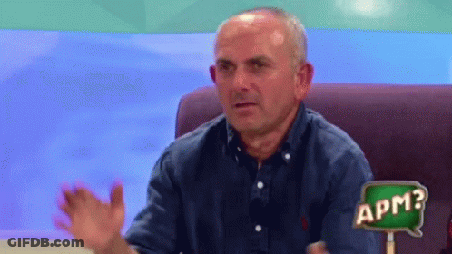 Man Sitting In Chair With APM Sign GIF