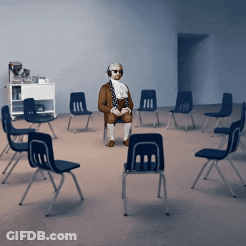 Man Sitting In Chair With Blue Chairs GIF