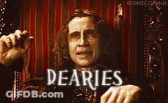 Man Sitting In Chair With Dearies On Face GIF