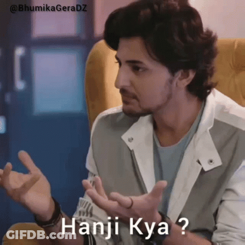 Man Sitting In Chair With Hands Out Saying Hanj Kya GIF