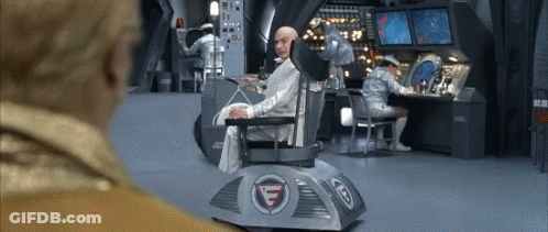 Man Sitting In Chair With Letter A GIF
