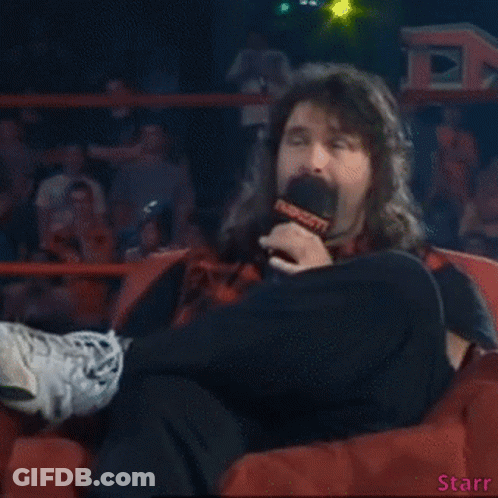 Man Sitting In Chair With Microphone Saying Starr GIF
