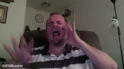 Man Sitting In Chair With Mouth Open GIF