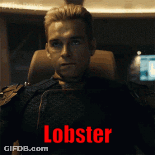 Man Sitting In Chair With Red Lobster Text GIF