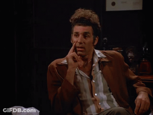 Man Sitting In Chair With True Behind GIF
