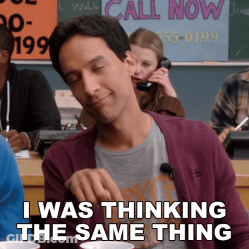 Man Sitting In Classroom With Call Now Sign GIF