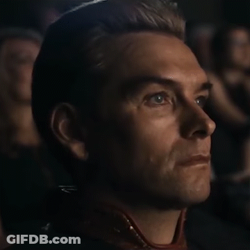 Man Sitting In Dark Room Looking Up GIF