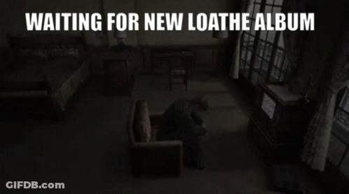Man Sitting In Dark Room Waiting For Loathe Album GIF