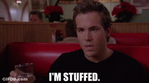 Man Sitting In Diner Holding Glass Of Water GIF