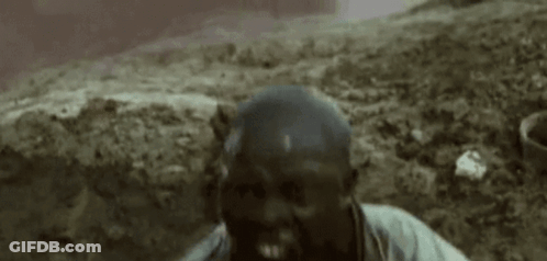 Man Sitting In Dirt Screaming GIF