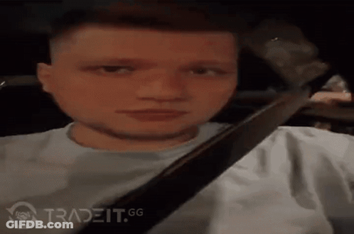 Man Sitting In Driver's Seat With Gun GIF