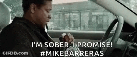 Man Sitting In Driver Seat Holding Cigarette GIF