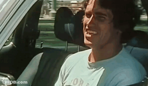 Man Sitting In Driver Seat Smiling Eyes Closed GIF
