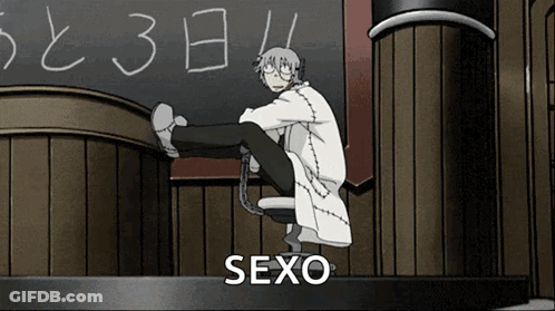 Man Sitting In Front Of Blackboard With Sexo GIF
