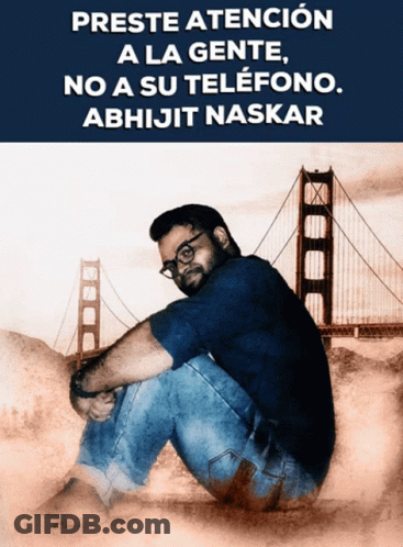 Man Sitting In Front Of Bridge Preste Atencion A La Gente GIF
